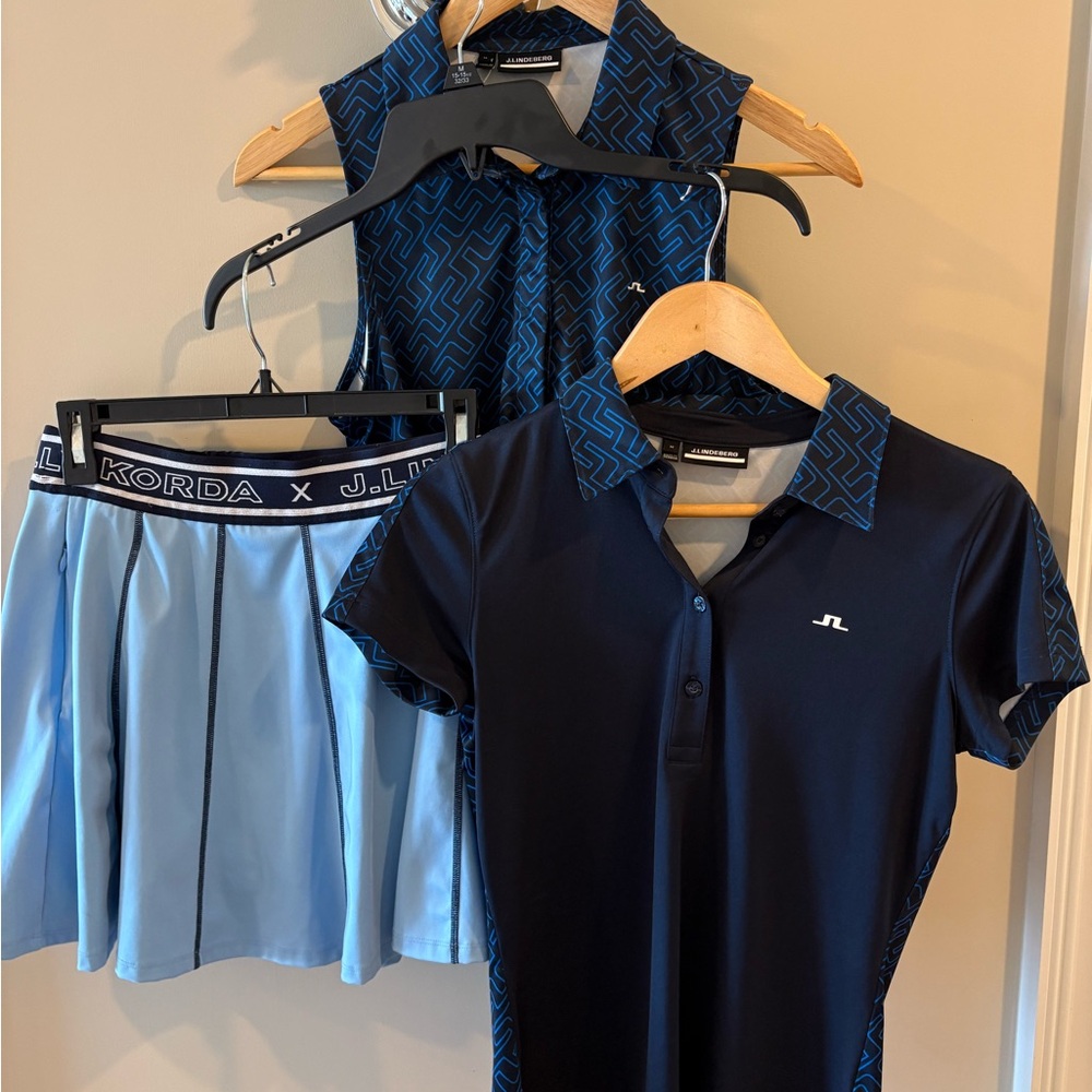 J.Lindeberg women’s golf Dark Blue polo and skirt